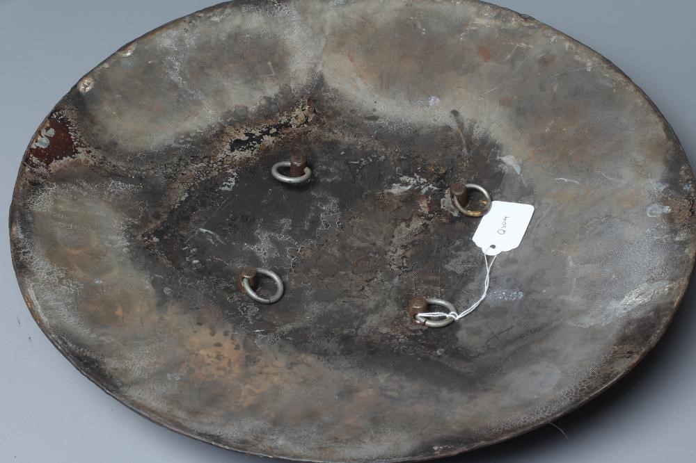 AN INDIAN STEEL CIRCULAR DHAL SHIELD with four bosses and decorated with erotic scenes, 17" diameter Image