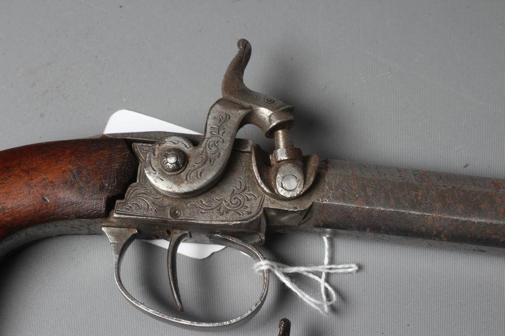 TWO PERCUSSION POCKET PISTOLS, 19th century, both with scroll decoration and wooden grips, largest Image