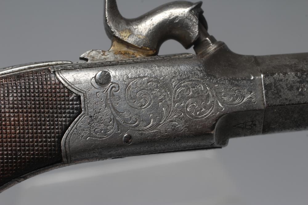 A PERCUSSION POCKET PISTOL with 1 5/8" octagonal twist off barrel Image