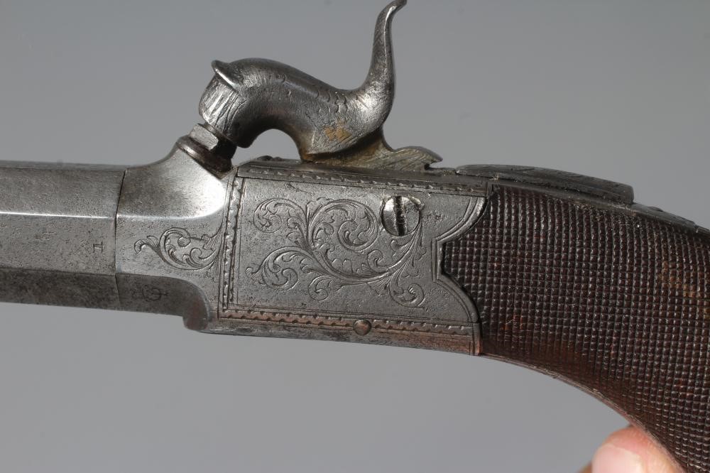 A PERCUSSION POCKET PISTOL with 1 5/8" octagonal twist off barrel Image