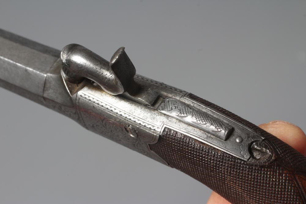 A PERCUSSION POCKET PISTOL with 1 5/8" octagonal twist off barrel Image