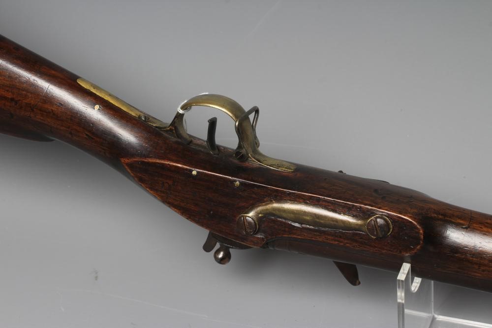 A FLINTLOCK MILITARY MUSKET with 39 3/8" barrel, action etched with pagoda style armorial, walnut Image