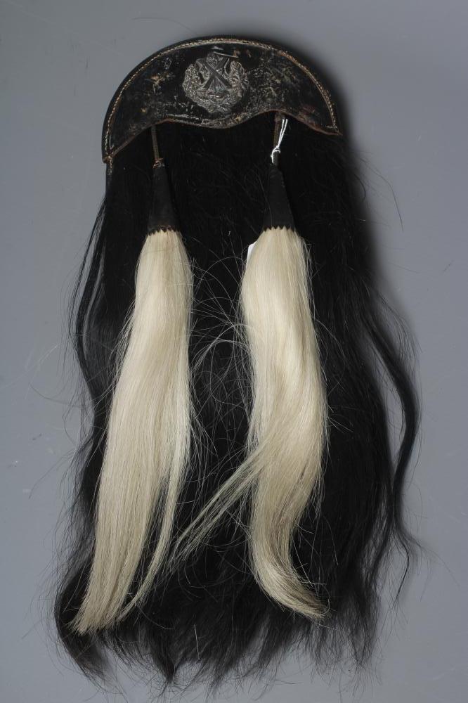 A CAMERON HIGHLANDERS SPORRAN, early 20th century, with regimental badge, black horse hair body and Image