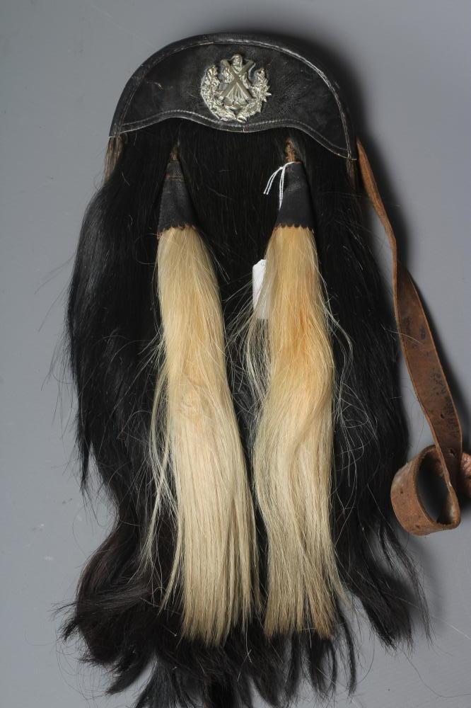 A CAMERON HIGHLANDERS SPORRAN, early 20th century, with regimental badge, black horse hair body and Image