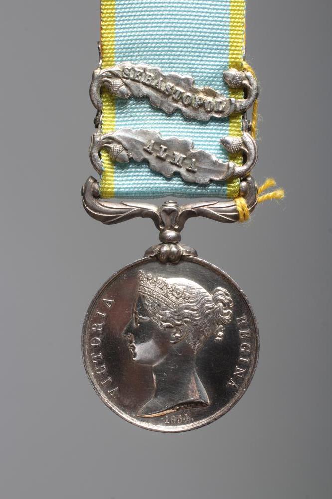 A CRIMEA 1854 MEDAL, awarded to J. Aust of the 30th Regiment, with Sebastopol and Alma clasps (Est. Image