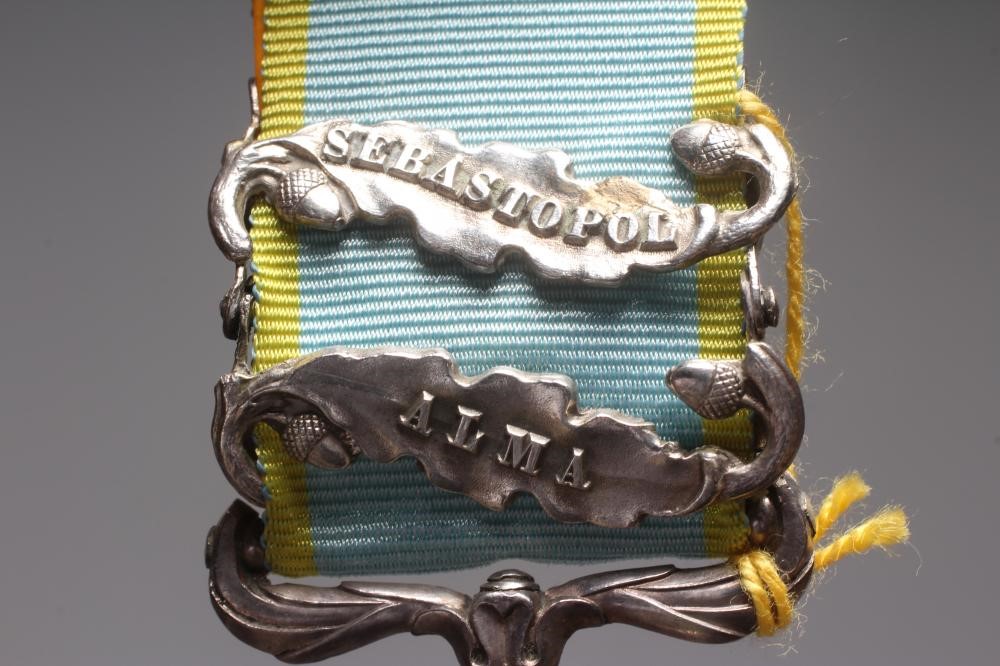 A CRIMEA 1854 MEDAL, awarded to J. Aust of the 30th Regiment, with Sebastopol and Alma clasps (Est. Image