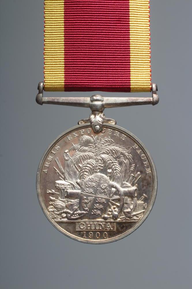 A CHINA 1900 MEDAL, awarded to Lance Corporal E. E. Mills of the Royal Marines, HMS Marathon (Est. Image