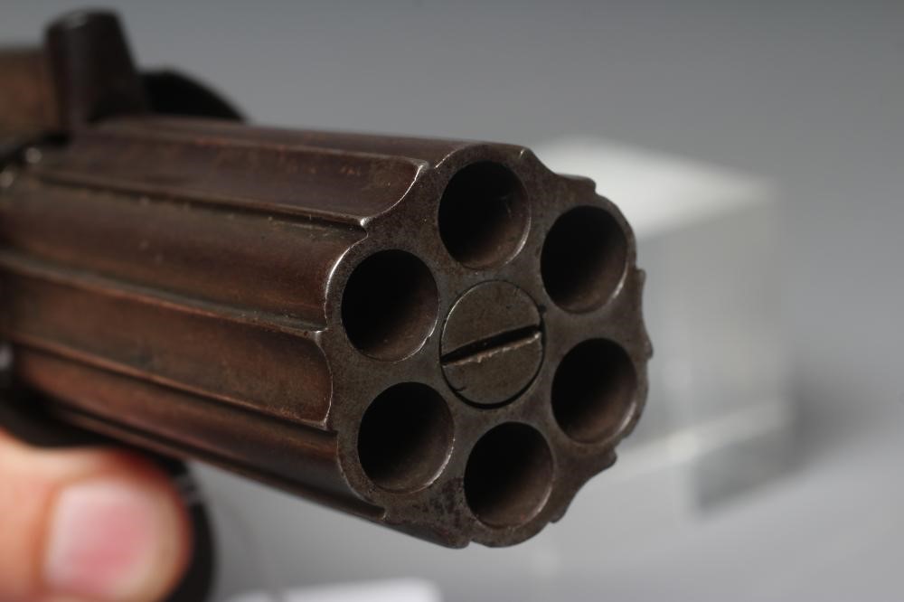 A PERCUSSION PEPPER BOX PISTOL by D. Egg of London, with six shot revolver barrels, foliate etched Image