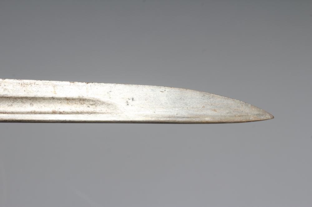 A RARE BRITISH 1907 BAYONET with hooked quillon, 17" blade, two piece wood grip, and leather Image