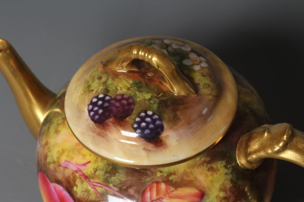 A ROYAL WORCESTER TEAPOT AND COVER Image
