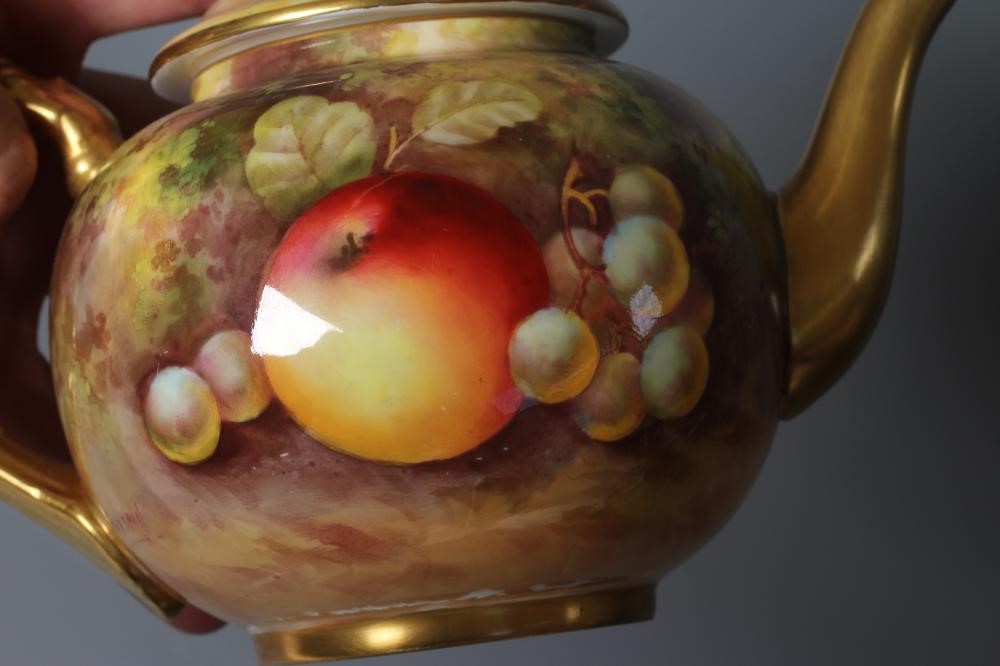 A ROYAL WORCESTER TEAPOT AND COVER Image