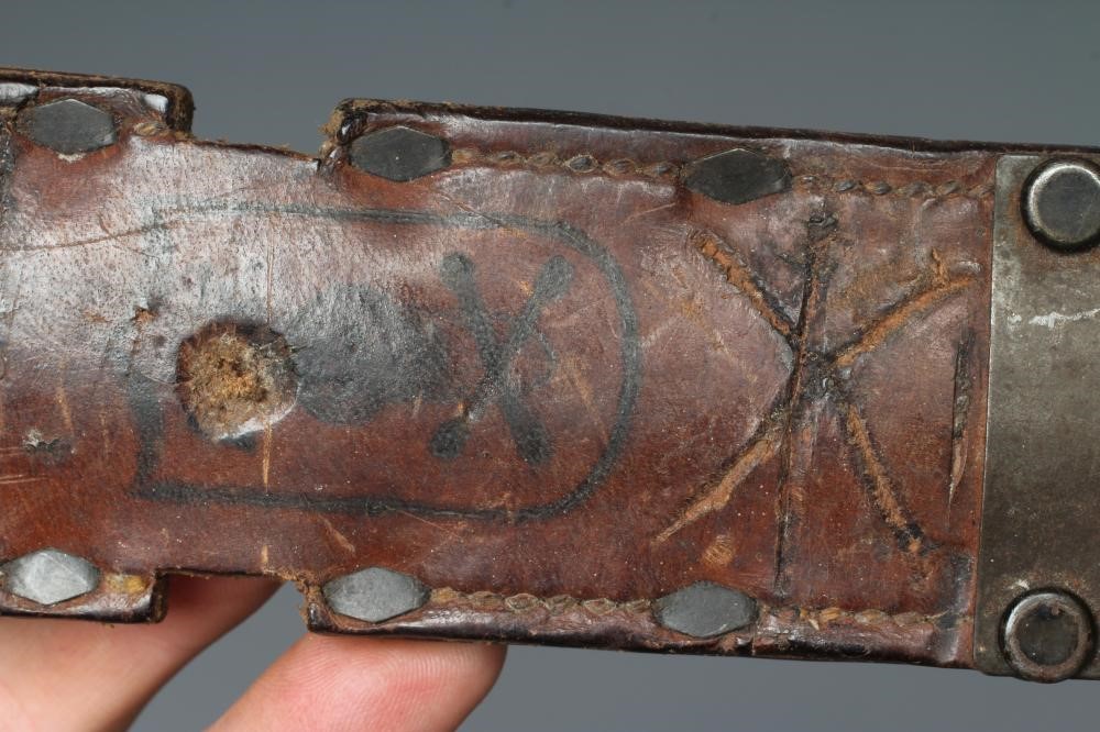 A US M3 CAMILLUS FIGHTING KNIFE with 6 5/8" spear point blade, leather sectional grip, and leather Image