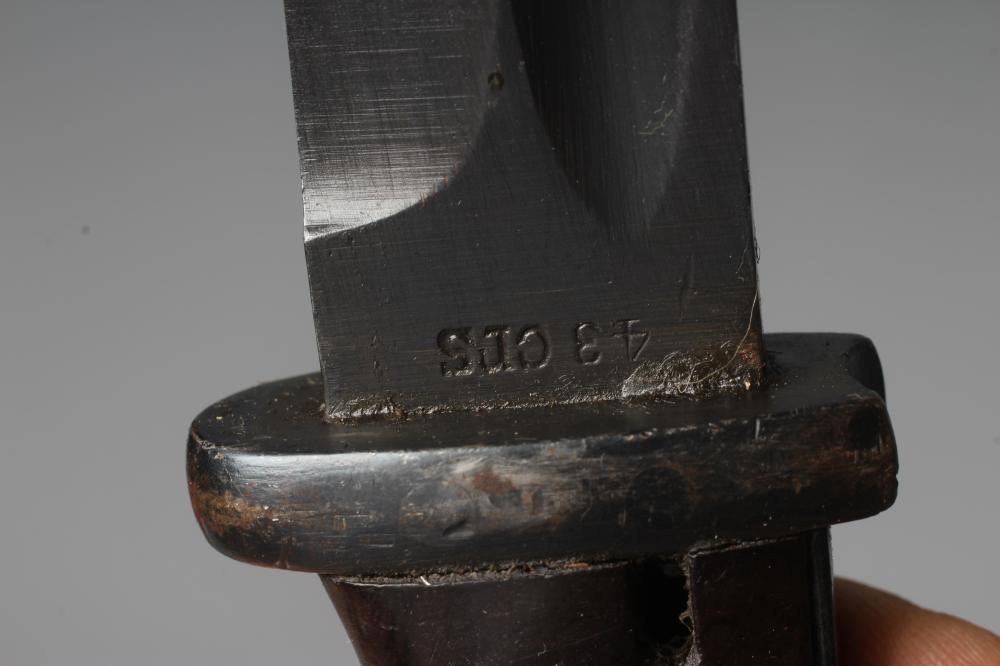 TWO BAYONETS, comprising a K98 German bayonet with steel scabbard and leather frog, and a French Image