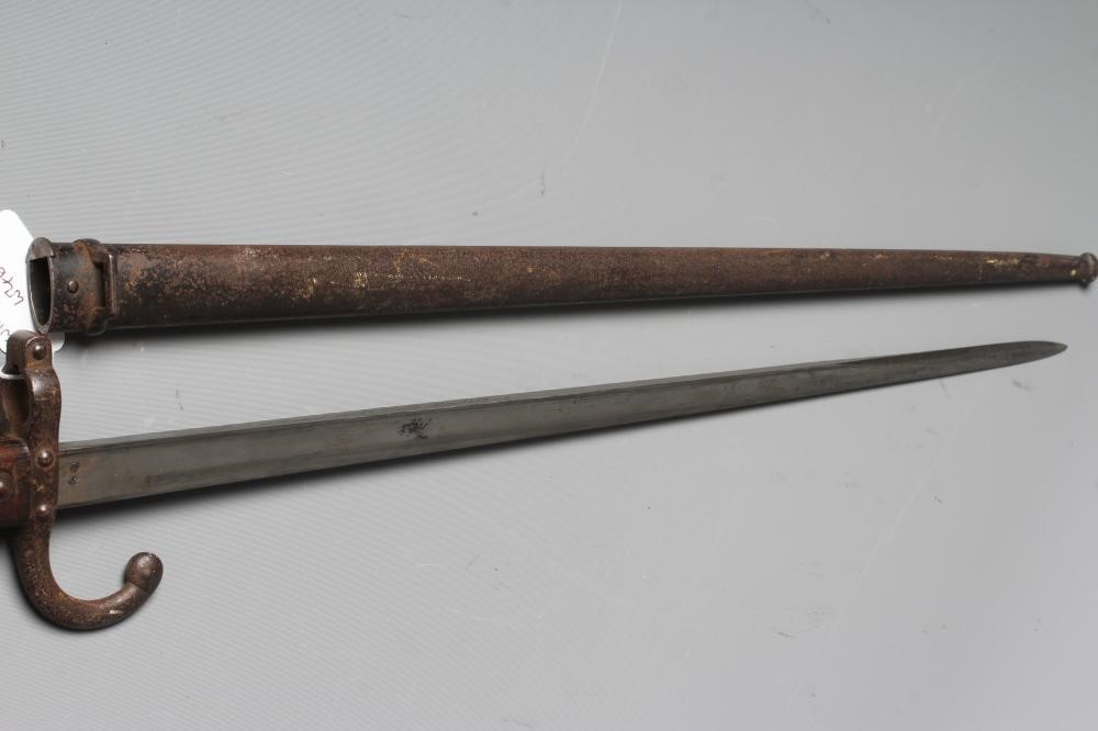 TWO BAYONETS, comprising a K98 German bayonet with steel scabbard and leather frog, and a French Image