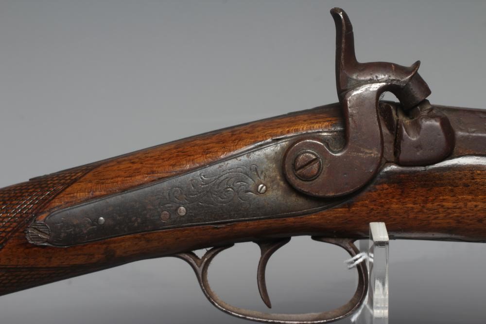 A PERCUSSION SPORTING MUSKET, the 30 1/4" barrel octagonal at the breech, foliate etched action, Image