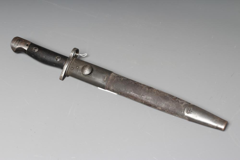 A RARE OWEN SMG BAYONET with 10" blade, two piece wood grip stamped "SLAZ44" and leather scabbard Image