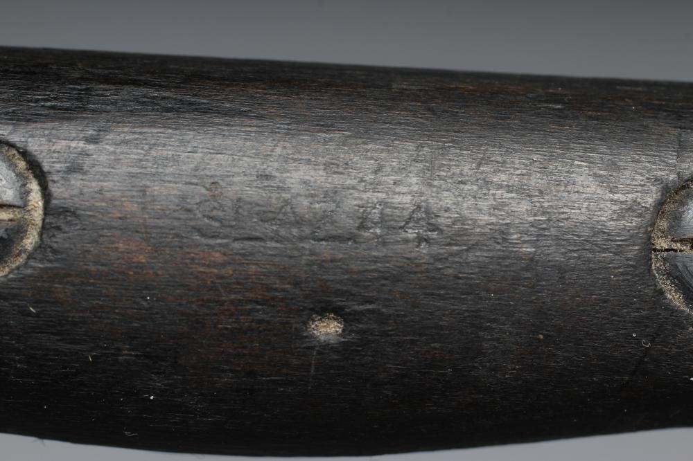 A RARE OWEN SMG BAYONET with 10" blade, two piece wood grip stamped "SLAZ44" and leather scabbard Image