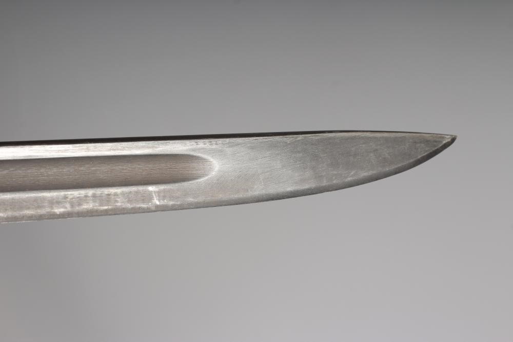 A RARE OWEN SMG BAYONET with 10" blade, two piece wood grip stamped "SLAZ44" and leather scabbard Image