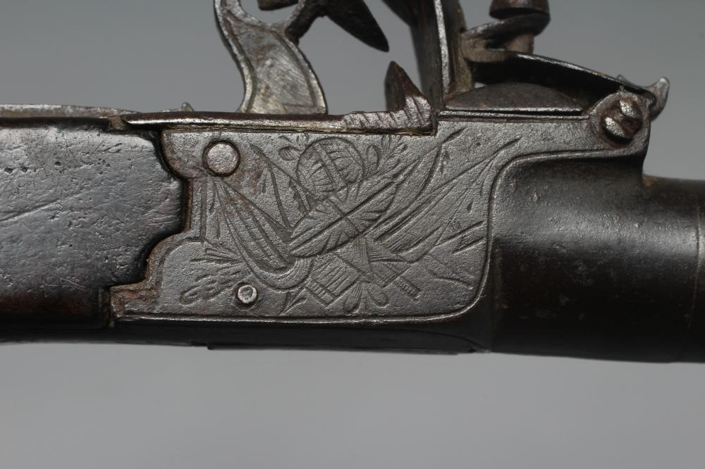 A FLINTLOCK POCKET PISTOL by Dunderdale, Mabson & Labron, with 1 3/4" barrel, action etched with Image