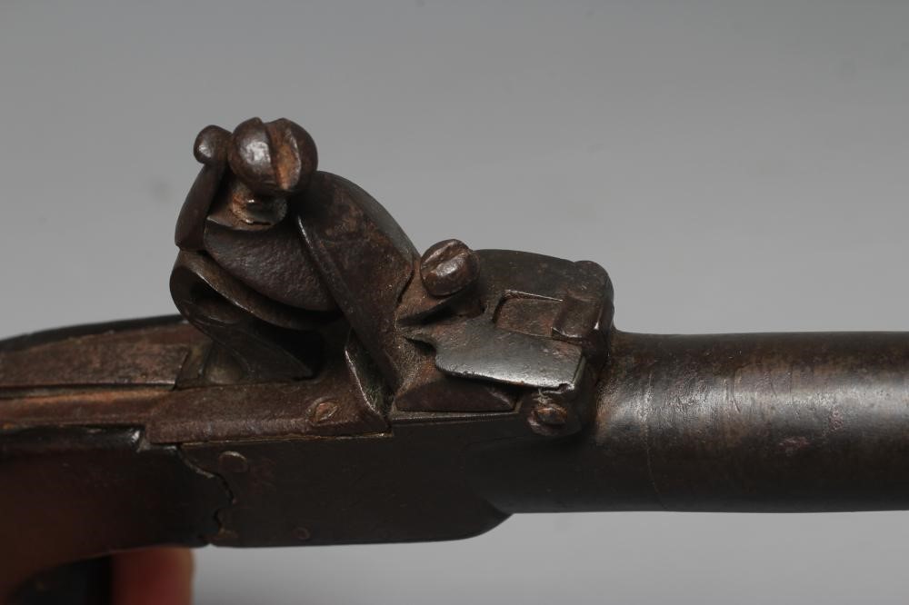 A FLINTLOCK POCKET PISTOL by Dunderdale, Mabson & Labron, with 1 3/4" barrel, action etched with Image