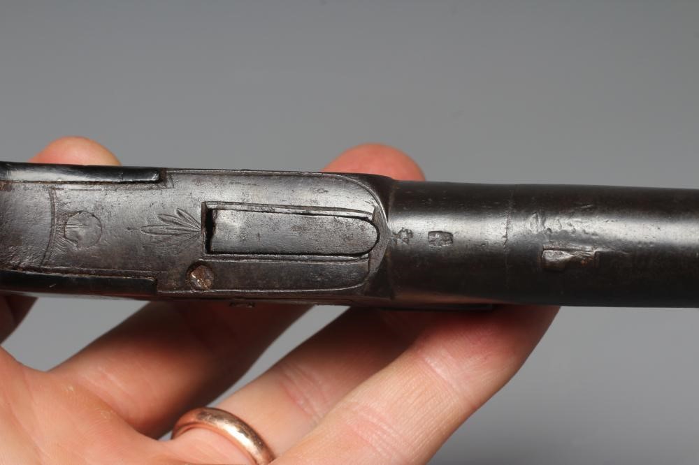 A FLINTLOCK POCKET PISTOL by Dunderdale, Mabson & Labron, with 1 3/4" barrel, action etched with Image
