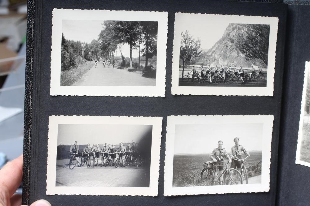 A HITLER YOUTH PHOTO ALBUM, containing 50 original images from the pre-war and war time period (Est. Image