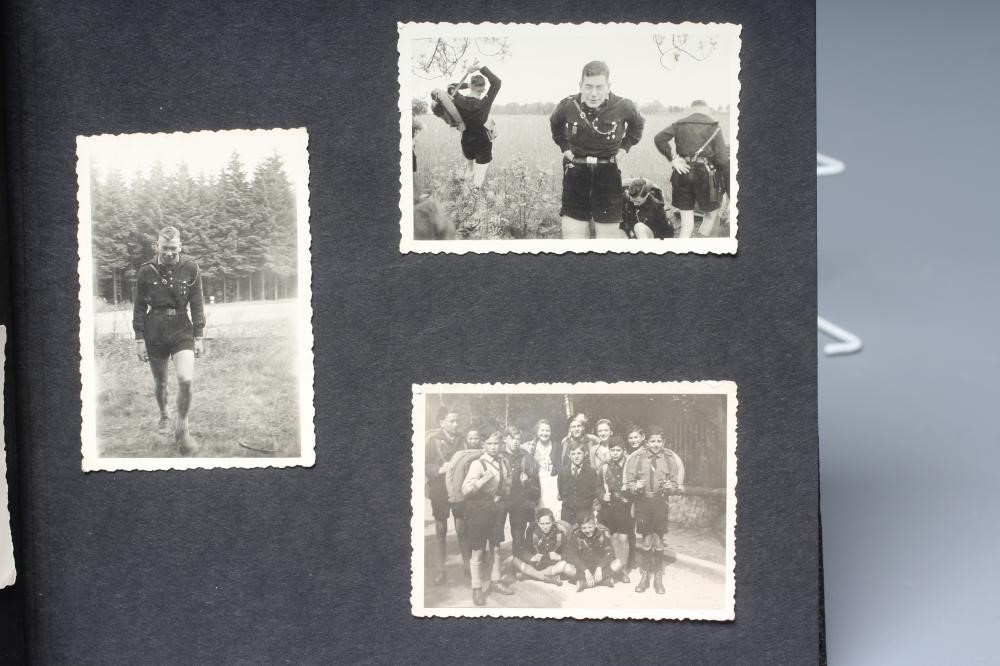 A HITLER YOUTH PHOTO ALBUM, containing 50 original images from the pre-war and war time period (Est. Image