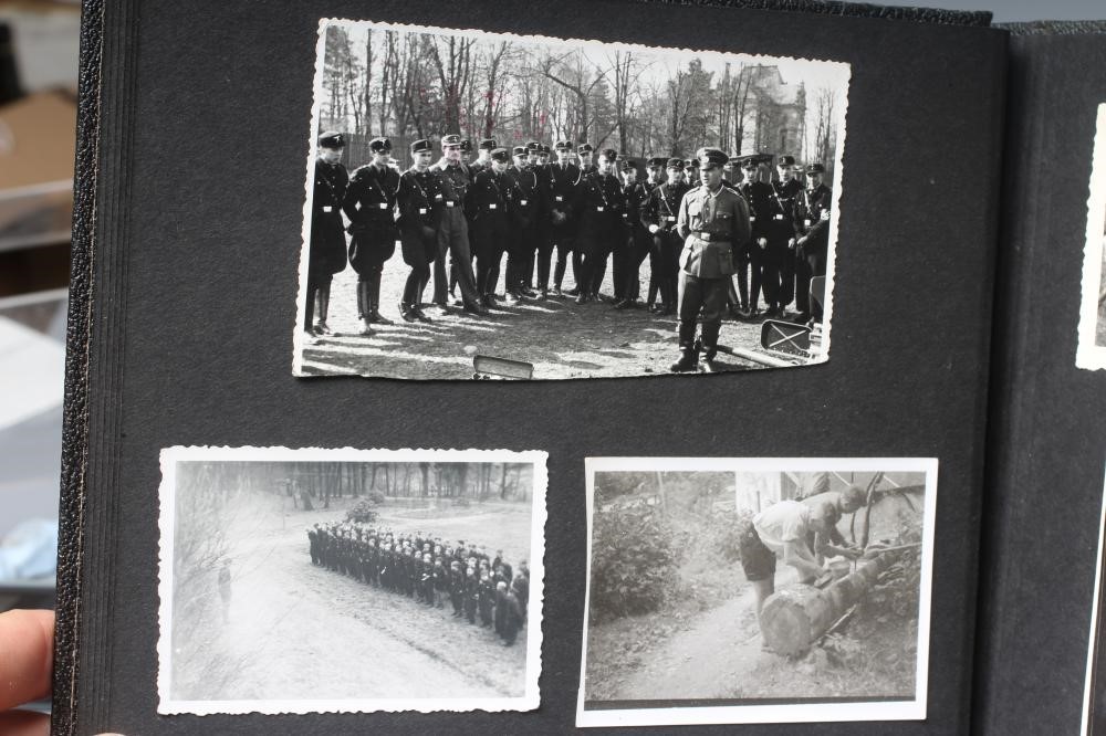 A HITLER YOUTH PHOTO ALBUM, containing 50 original images from the pre-war and war time period (Est. Image