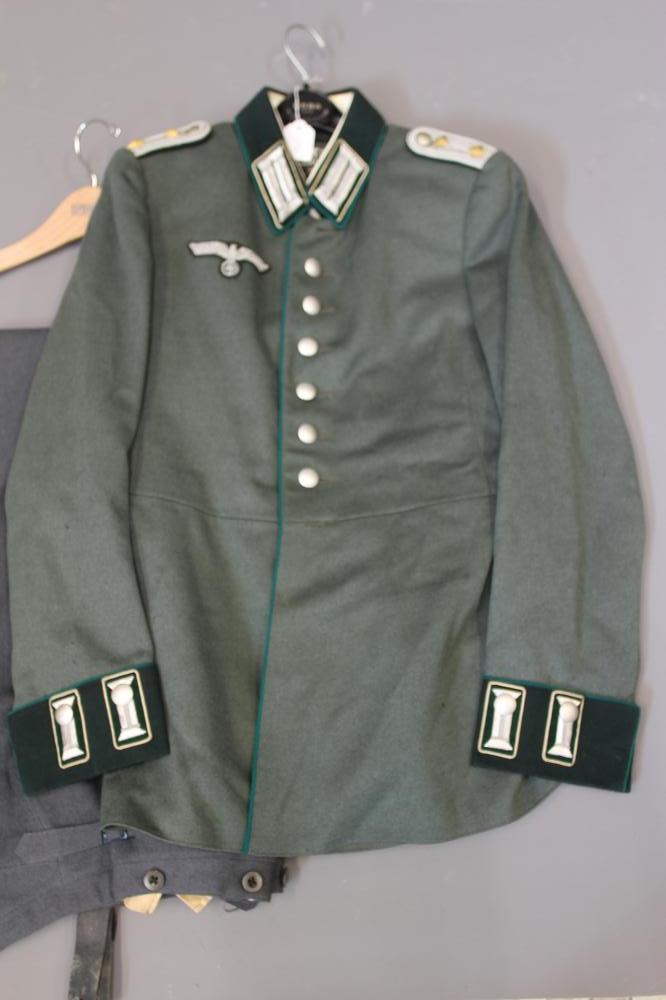 A GERMAN THIRD REICH MILITARY DRESS UNIFORM by Robert Bittner, Oppeln, comprising tunic and trousers Image
