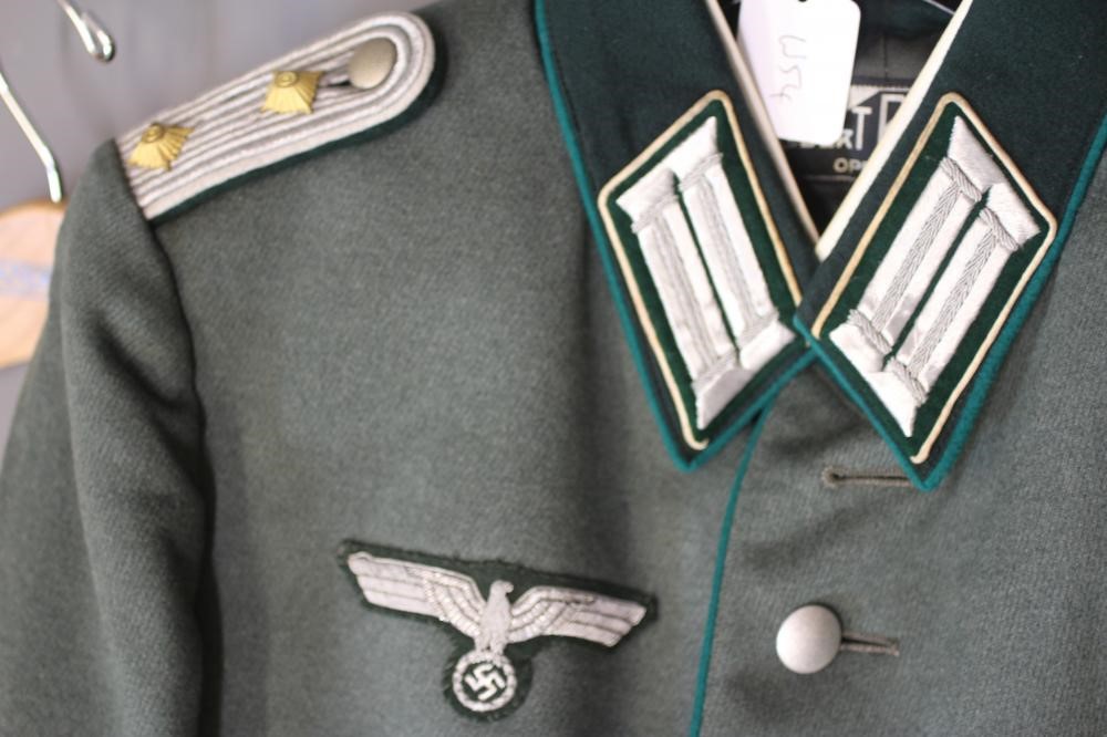 A GERMAN THIRD REICH MILITARY DRESS UNIFORM by Robert Bittner, Oppeln, comprising tunic and trousers Image