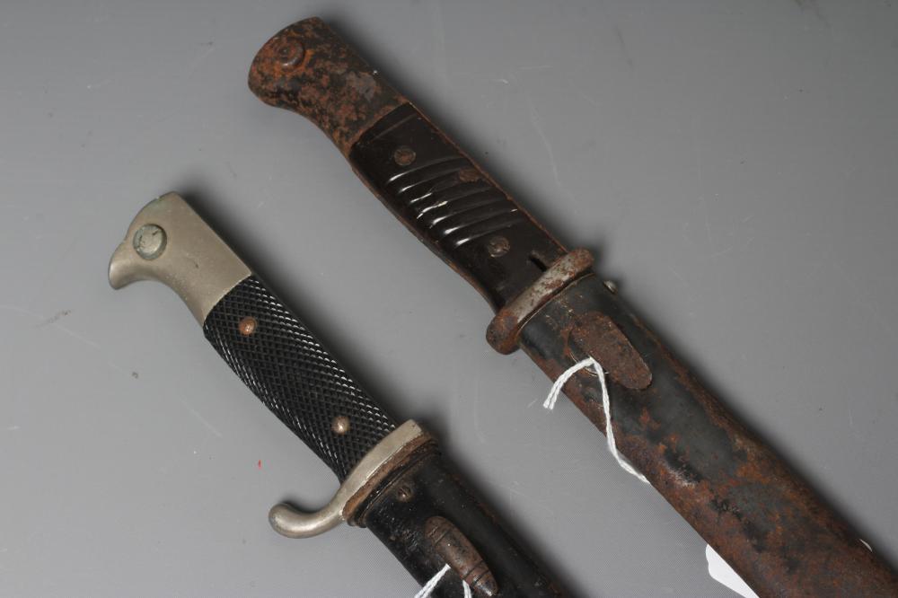TWO GERMAN SECOND WORLD WAR BAYONETS, comprising a K98 bayonet, and a WKC dress bayonet, longest 16" Image
