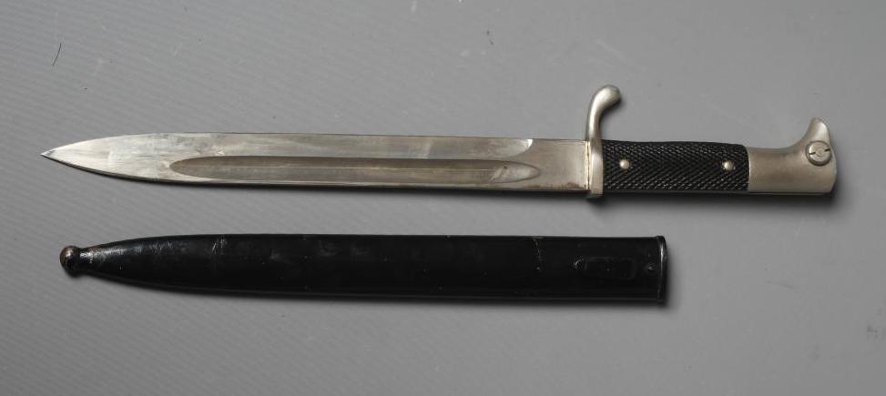 A GERMAN DRESS BAYONET, with 9 3/4" blade, maker's mark for Eikhorn Solingen, black plastic Image