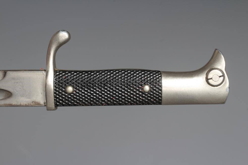 A GERMAN DRESS BAYONET, with 9 3/4" blade, maker's mark for Eikhorn Solingen, black plastic Image