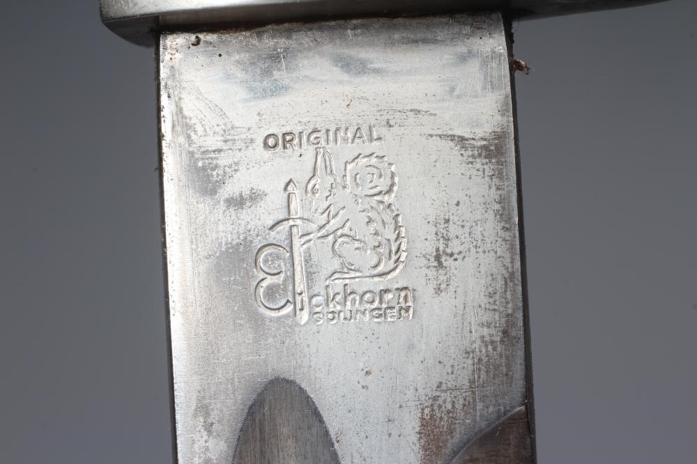 A GERMAN DRESS BAYONET, with 9 3/4" blade, maker's mark for Eikhorn Solingen, black plastic Image