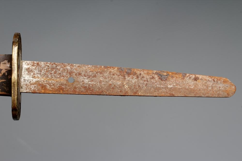 A JAPANESE WAKAZASHI with 23 1/2" blade, signed tang, Second World War mounts and leather saya, 36" Image