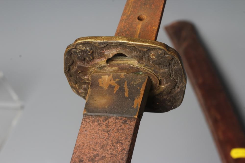 A JAPANESE WAKAZASHI with 23 1/2" blade, signed tang, Second World War mounts and leather saya, 36" Image