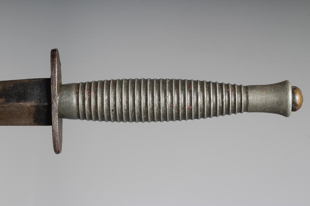 A FAIRBAIRN & SYKES COMMANDO DAGGER with 6 3/4" blade, cross guard stamped ENGLAND, ribbed grip Image