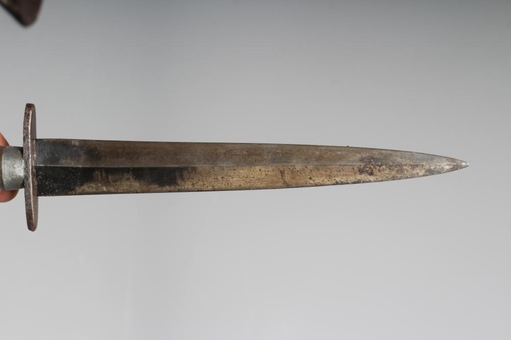A FAIRBAIRN & SYKES COMMANDO DAGGER with 6 3/4" blade, cross guard stamped ENGLAND, ribbed grip Image