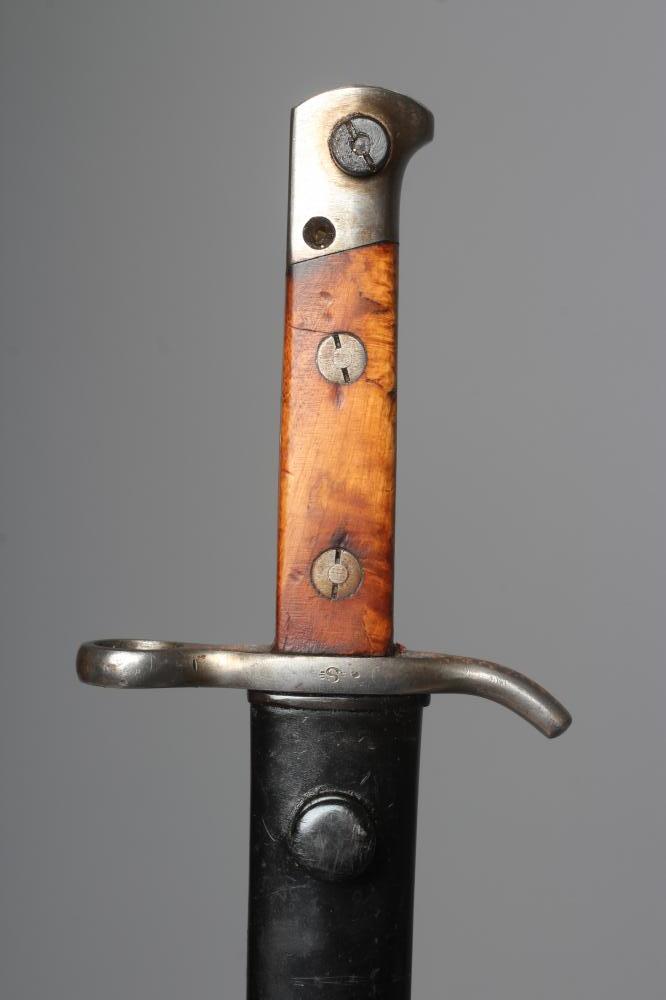 A FINNISH 1935 PATTERN BAYONET by Fiskars, with 11 3/4" blade, maple grips, S stamped to cross guard Image