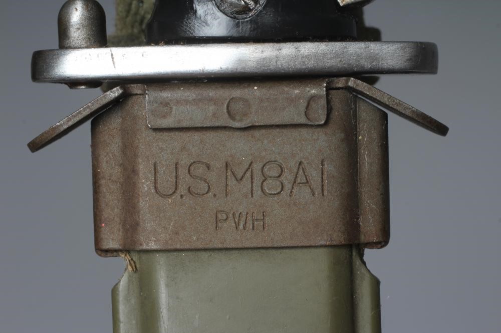 TWO US M8A1 BAYONETS, MK4 and M5A1 patterns, both with plastic scabbards and canvas frogs, each 13" Image