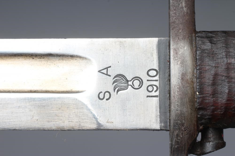 A US 1905 PATTERN SPRINGFIELD BAYONET with canvas scabbard Image