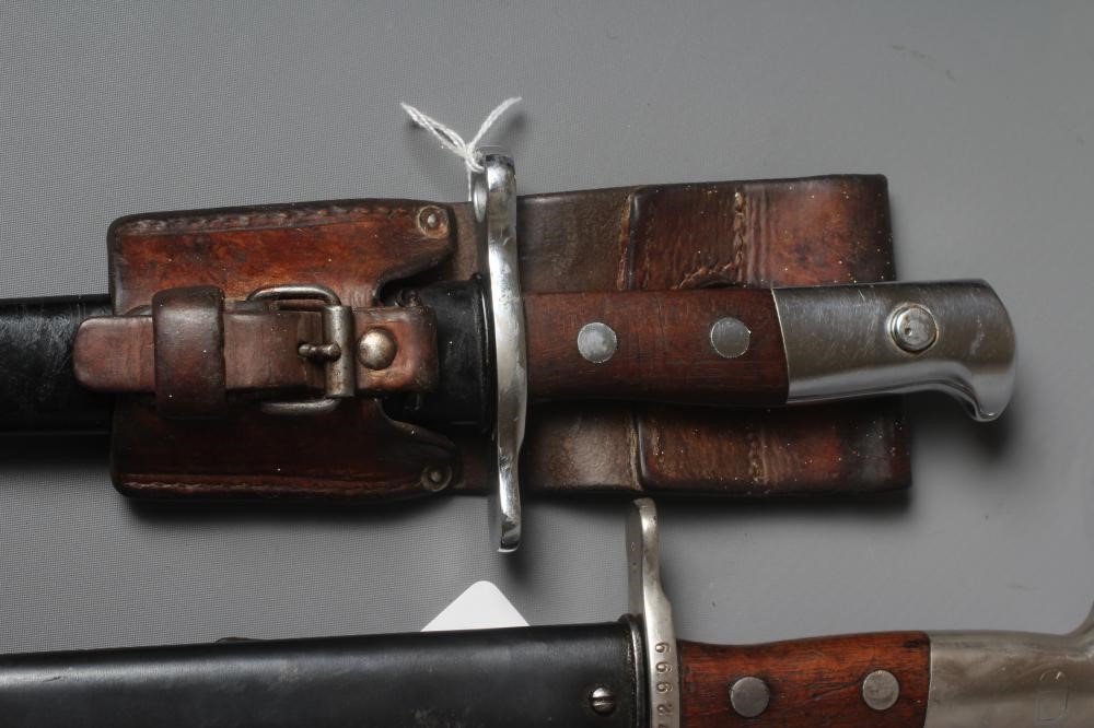 TWO SWISS 1918/31 PATTERN BAYONETS both with 11 3/4" blades and steel scabbards Image