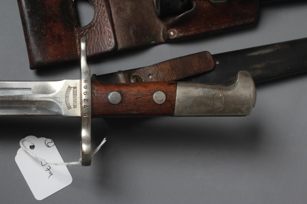 TWO SWISS 1918/31 PATTERN BAYONETS both with 11 3/4" blades and steel scabbards Image