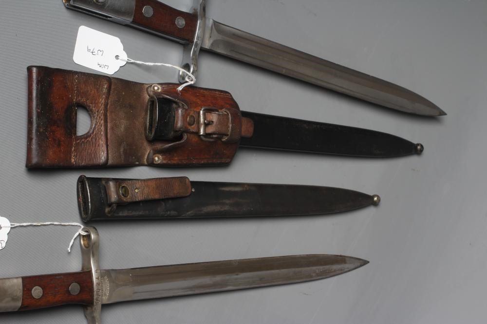 TWO SWISS 1918/31 PATTERN BAYONETS both with 11 3/4" blades and steel scabbards Image