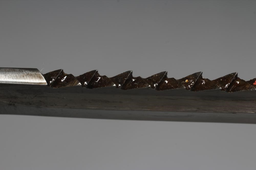 A GERMAN 1898/05 PATTERN SAW BACK BAYONET with 14 1/4" blade, all metal ribbed hilt with original Image