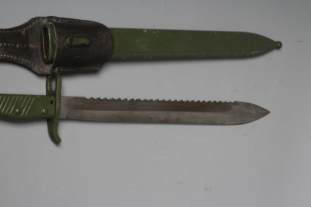 A GERMAN 1898/05 PATTERN SAW BACK BAYONET with 14 1/4" blade, all metal ribbed hilt with original Image
