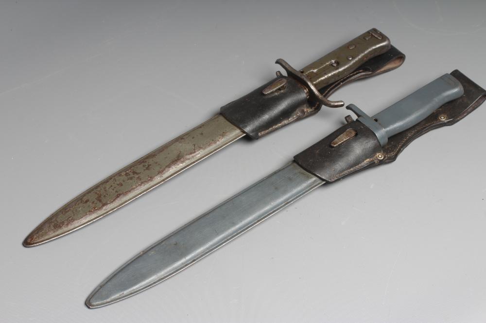 TWO GERMAN ERSATZ ALL STEEL BAYONETS, comprising a knife bayonet with 12 1/4" blade and another with Image