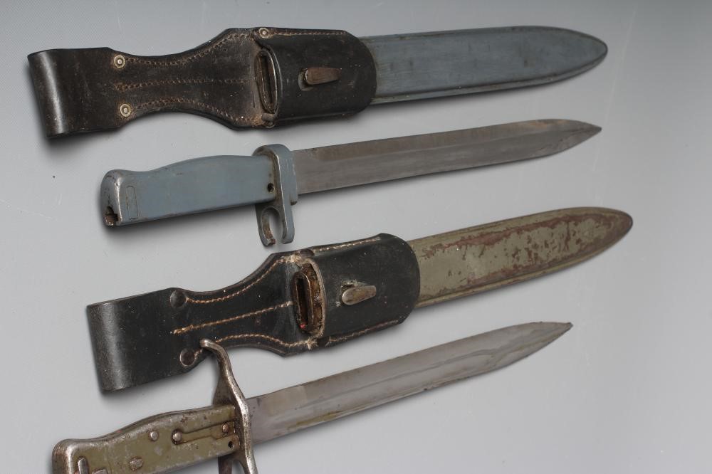 TWO GERMAN ERSATZ ALL STEEL BAYONETS, comprising a knife bayonet with 12 1/4" blade and another with Image