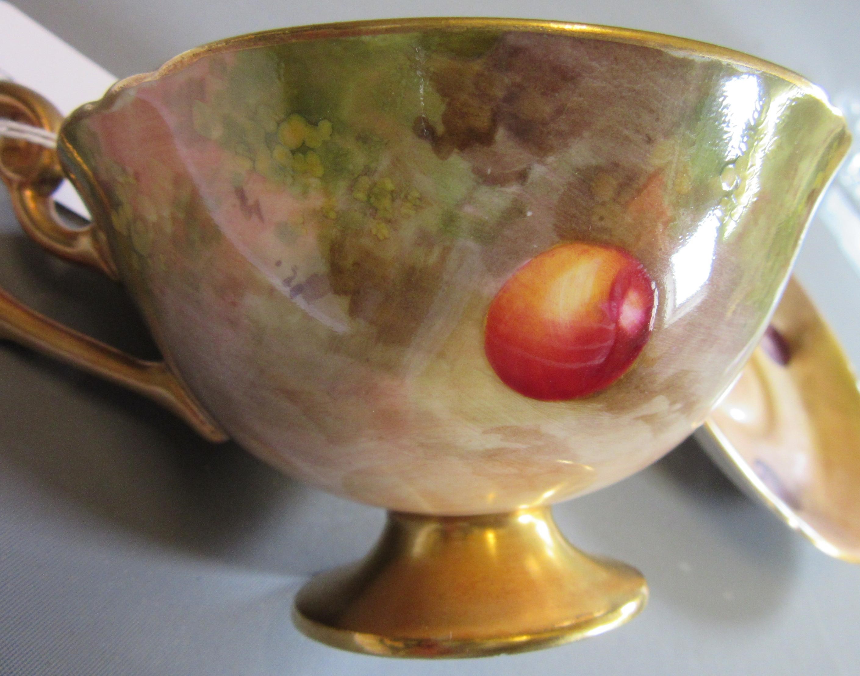 A ROYAL WORCESTER CABINET CUP AND SAUCER Image