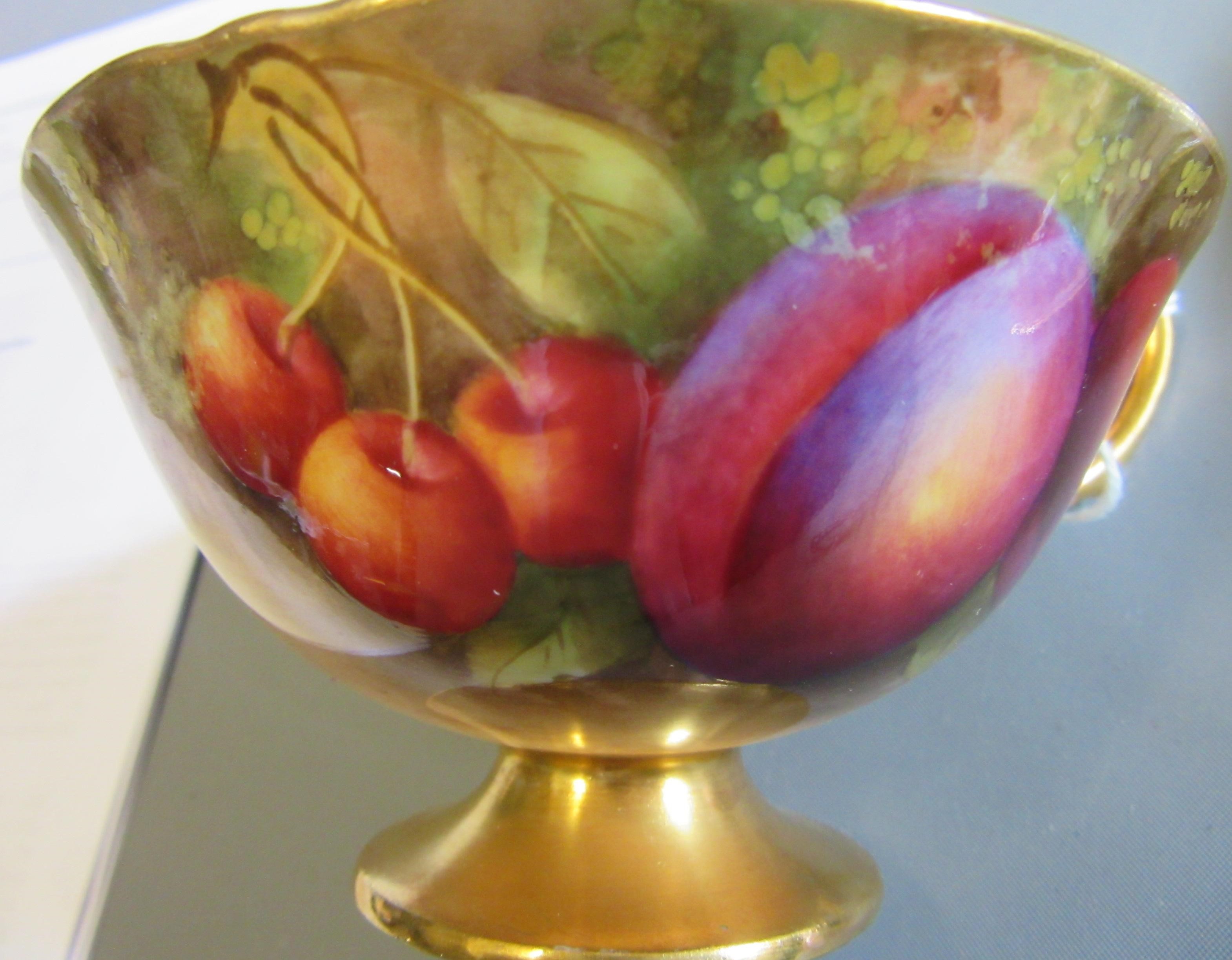 A ROYAL WORCESTER CABINET CUP AND SAUCER Image